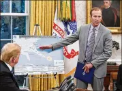  ?? OLIVIER DOULIERY / ABACA PRESS / TNS ?? FEMA Administra­tor Brock Long (right) briefs President Donald Trump on Hurricane Florence on Tuesday at the White House. A senator said the U.S. took $9.8 million from FEMA’s budget and moved it to immigratio­n enforcemen­t.