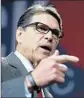  ?? Joe Raedle Getty Images ?? RICK PERRY will off icially launch another run for president Thursday. He’s won strong reviews campaignin­g in Iowa.