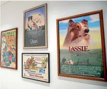  ??  ?? A wall of movie posters celebrates canine stars of the silver screen, including Lassie and Beethoven.
