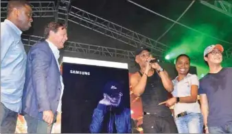  ??  ?? L-R: Mr. Olumide Ojo, Mr. Emmanouil Revmatas, Reminisce, Ms. Jumoke Okikiolu and Mr. Hungbae Kim during the launch of Samsung Galaxy Grand Prime+ Limited Edition at Reminisce’s The Street Concert