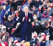  ?? AP PHOTO/CARLOS OSORIO ?? President Donald Trump arrives at a campaign rally Saturday in Norton Shores, Mich.