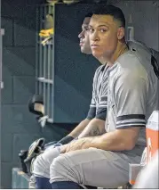  ?? HOWARD SIMMONS / NEW YORK DAILY NEWS ?? Yankees sluggers Aaron Judge (right) and Gary Sanchez combined for 85 home runs, best in MLB history by a pair of teammates 25 or younger.