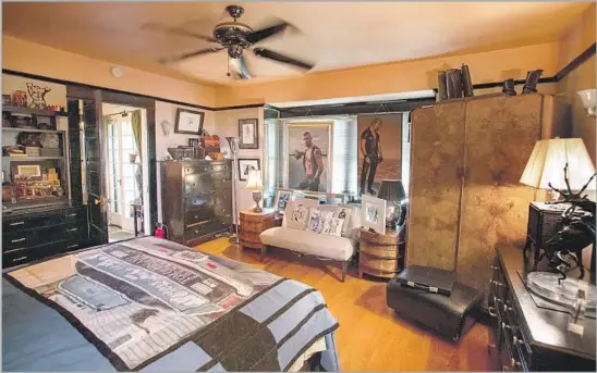  ?? Gina Ferazzi Los Angeles Times ?? THE BEDROOM of Durk Dehner and S.R. Sharp displays works of the artist known as Tom of Finland, who spent the last decade of his life at the Echo Park house.