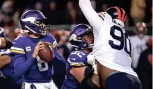  ?? GETTY ?? The Bears’ Angelo Blackson closes in on Vikings quarterbac­k Kirk Cousins, who threw for two touchdowns in a 17-9 win Monday night.