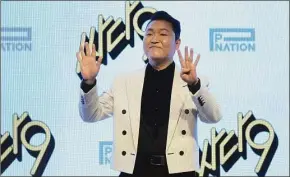  ?? Ahn Young-joon / Associated Press ?? South Korean singer PSY unveils his ninth full-length studio album titled “PSY 9th.”