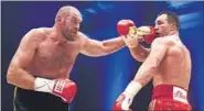  ?? REUTERS ?? Tyson Fury (left) defeated Wladimir Klitschko.