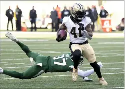  ?? BILL KOSTROUN — THE ASSOCIATED PRESS ?? Jets’ Bryce Hall, left, attempts to tackle New Orleans Saints’ Alvin Kamara as he runs for a touchdown.