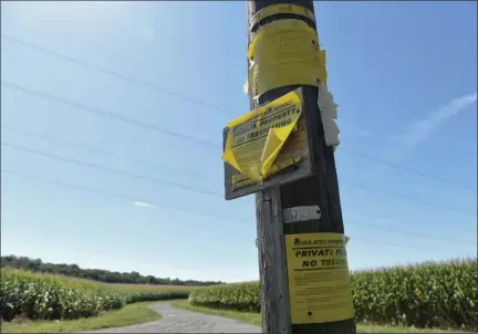  ?? BILL UHRICH — MEDIANEWS GROUP ?? Warning signs at the Crossley Farm Superfund Site along Huffs Church Road at Blackhead Hill in Hereford Township, Berks County. Remediatio­n on the water supply has been ongoing for decades since at least 1,200 barrels of cancer-causing industrial solvent and degreaser were dumped there by the former owners.