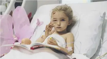  ??  ?? Elif Perincek, a three-year-old earthquake survivor, in hospital after being rescued