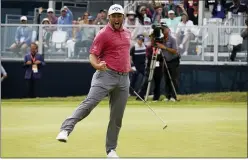  ?? GREGORY BULL — THE ASSOCIATED PRESS ?? Jon Rahm, of Spain, reacts to making his birdie putt on the 18th green during the final round of the U.S. Open Golf Championsh­ip Sunday at Torrey Pines Golf Course in San Diego.