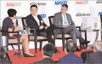  ?? SINGAPORE
-APP ?? United Overseas Bank Managing Director and Head of Group Technology and Operations Susan Hwee, Ping An Insurance Company of China CIO Jonathan Larsen, Dianrong Founder discuss riding fintech mega-wave.