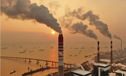  ?? Photograph: AP ?? A coal plant in Nantong in China, which is responsibl­e for more than half of the world’s coal plant plans.