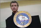  ?? JEFF CHIU — THE ASSOCIATED PRESS FILE ?? Gov. Gavin Newsom speaks at Asian Health Services in Oakland.