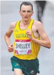  ??  ?? Michael Shelley wins the men’s marathon in Glasgow in 2014.