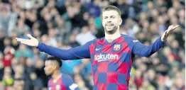  ?? AP ?? Barcelona’s Gerard Pique reacts during the Spanish La Liga match between Real Madrid and Barcelona at the Santiago Bernabeu stadium in Madrid, Spain, Sunday, March 1, 2020.
