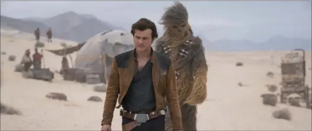  ?? LUCASFILM ?? Alden Ehrenreich is Han Solo, and Joonas Suotamo portrays Chewbacca in a scene from “Solo: A Star Wars Story.”