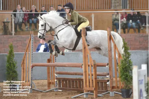  ??  ?? Amber Marnane and Danny’s Pride are crowned supreme working hunter pony champions, taking home a whopping £1,000 in prize-money Northern Ireland Festival, Cavan Internatio­nal EC, Co. Cavan