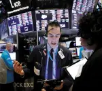  ??  ?? Traders at the New York Stock Exchange last week