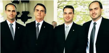  ??  ?? Presidente eleito do Brasil Jair Bolsonaro e os três que estão na política