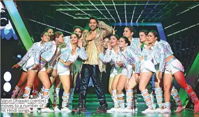  ?? ?? Varun Dhawan (centre) moves to a number of hit Hindi songs.