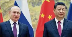  ?? Alexei Druzhinin / Getty Images ?? Russian President Vladimir Putin and Chinese President Xi Jinping met on Feb. 4 in Beijing.