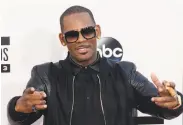  ?? Frederic J. Brown / AFP / Getty Images 2013 ?? R. Kelly, one of pop music’s best-selling artists, has denied accusation­s of sexual misconduct.