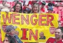  ??  ?? RARE SIGHT THIS SEASON: Arsenal supporters wanting their boss to stay