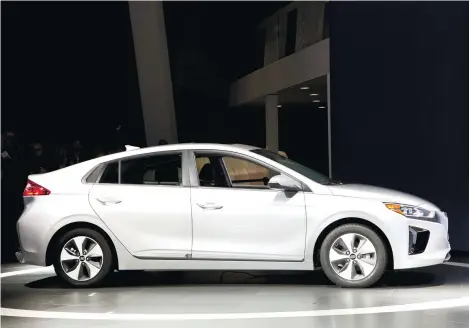  ?? (AP PHOTO) ?? IONIQ.
The 2017 Hyundai Ioniq electric vehicle on display at last month’s New York Internatio­nal Auto Show. .