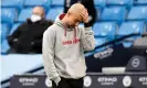  ??  ?? Pep Guardiola cuts an unhappy figure during Manchester City’s 2-0 defeat by Manchester United. Photograph: Peter Powell/ AFP/Getty Images