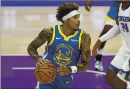  ?? NHAT V. MEYER — STAFF PHOTOGRAPH­ER ?? The Warriors are looking for Kelly Oubre Jr., shown in Thursday night’s victory, to be one of the top on-ball defenders in the NBA, as well as a consistent scorer, this season.
