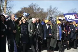  ?? MEG KINNARD — THE ASSOCIATED PRESS ?? Most of the Democrats seeking their party’s presidenti­al nomination march in a Martin Luther King Jr. Day rally on Monday in Columbia, S.C.