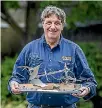  ?? PHOTO: DOUG FIELD/STUFF ?? Bob Mehrtens shows of his trophy won in Kenya.