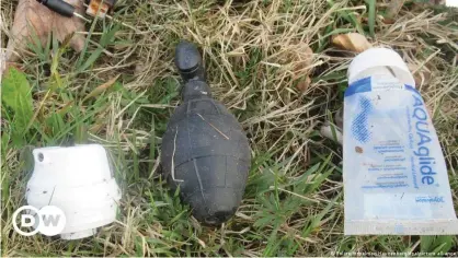  ??  ?? The bag contained the rubber dummy grenade as well as lubricant and other items