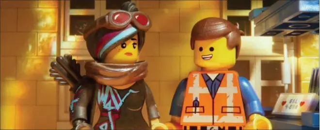  ?? WARNER BROS. PICTURES ?? While the last few years have hardened Lucy (voiced by Elizabeth Banks), Emmett (Chris Pratt) is still the happy-go-lucky guy he’s been in “The Lego Movie 2: The Second Part.”