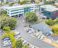  ??  ?? Two buildings at 6 Harrison Rd are anchored by NZ Chiropract­ic.