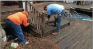  ?? PHOTOS PROVIDED ?? Rebuilding Together volunteers made deck and porch repairs at a local home during a recent work day. More projects are planned this Saturday and each of the next two weekends.