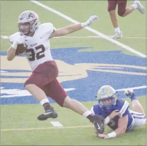  ?? Julie Chandler/Special to the Herald-Leader ?? Siloam Springs senior Brendan Lashley tries to slip the tackle attempt of Harrison’s Beck Jones during last Friday’s game in Harrison.