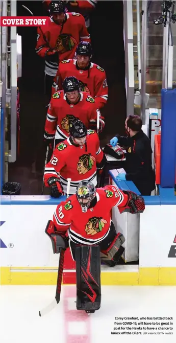 ?? JEFF VINNICK/GETTY IMAGES ?? Corey Crawford, who has battled back from COVID-19, will have to be great in goal for the Hawks to have a chance to knock off the Oilers.
