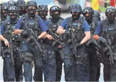  ?? GETTY IMAGES ?? London police patrol after a terrorist attack June 3. This year, at least 39 people have died in attacks in Western Europe.