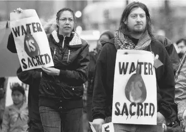  ?? GREG SOUTHAM/ EDMONTON JOURNAL ?? Idle No More demonstrat­ors take part in a march from Canada Place to the legislatur­e on Friday.