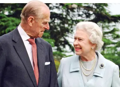 ?? ?? Diamond couple: The Queen and Prince Philip on their 60th wedding anniversar­y in 2007