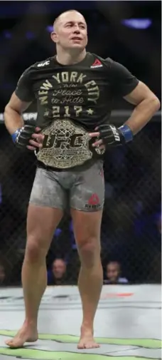  ?? FRANK FRANKLIN II/THE ASSOCIATED PRESS ?? In his first extended comments since winning the UFC middleweig­ht belt, Georges St-Pierre says he won’t keep contenders waiting too long.