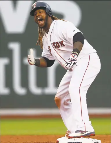  ?? Maddie Meyer / Getty Images ?? Hanley Ramirez of the Red Sox celebrates after hitting a two-run double in the seventh inning of Sunday’s game against the Astros at Fenway Park in Boston.