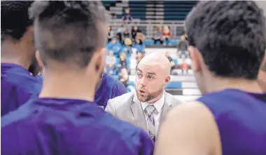  ?? ROBERTO E. ROSALES/JOURNAL ?? First-year Clovis boys coach Jaden Isler instructs his players during Friday’s 80-73 loss to top-ranked Cleveland.