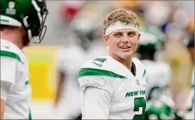  ?? Matt Ludtke / Associated Press ?? The New York Jets’ Zach Wilson is set to make his NFL regular-season debut against Carolina and previous Jets starter Sam Darnold.