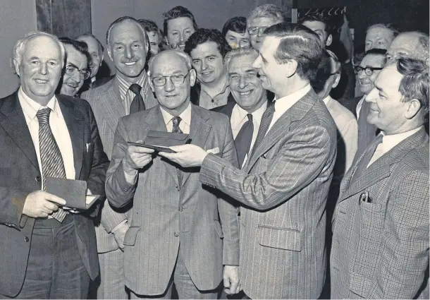  ??  ?? Two north-east Post Office workers, who collective­ly worked in the telecommun­ications divisions for 82 years, retired in 1978. John Davidson, of Garthdee, Aberdeen, and Robert Hendry, of Rosehearty, Buchan, were honoured at a special ceremony in Telephone House, Bridge Street, Aberdeen, by James Currie, right, deputy general manager of the North of Scotland Telephone area