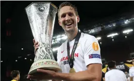  ??  ?? Luuk de Jong with the Europa League trophy. Photograph: Anadolu Agency/Getty Images