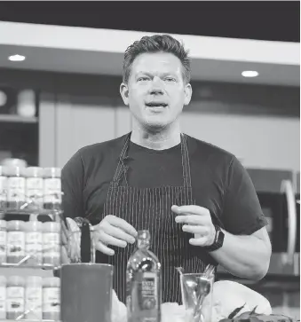  ?? NEILSON BARNARD/GETTY IMAGES ?? Celebrity chef Tyler Florence is giving up on cookbooks for an app that customizes dishes to people’s preference­s and needs. He says it will even help novices learn to cook.