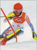  ?? Jae C. Hong ?? The Associated Press Favored, but failed, U.S. skier Mikaela Shiffrin competes in the women’s slalom at the Winter Olympics on Friday in South Korea.