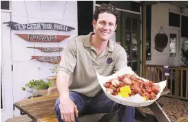  ?? Dave Rossman / For the Chronicle ?? Brooks Bassler says his Heights location of BB’s Cafe sells 12,000 pounds of crawfish a week during March and April.